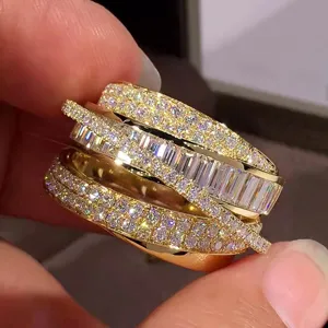 Close-up of a multi-layer sparkling pave diamond ring with elegant circular luxury design.