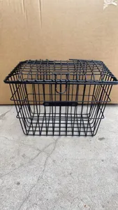 Black metal wire bicycle basket detail, durable mesh design with lid for front mounting.