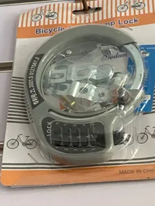 Detailed view of grey bicycle combination lock with number dials and mounting hardware on card.