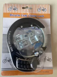 Detail view of bicycle crab clamp lock, showing combination dial, locking mechanism and hardware.