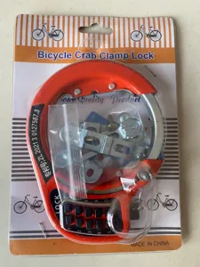 Detail view of the bicycle crab clamp lock with combination buttons and metal installation parts.