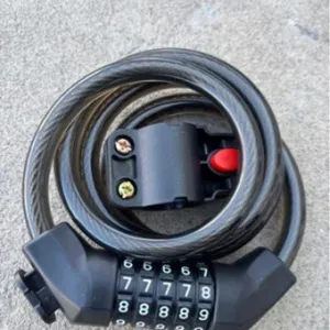 Heavy duty 5-digit combination bicycle cable lock with mounting bracket for mountain bike security.