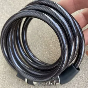 Black bike cable lock with 4-digit combination dial, secure steel wire bicycle anti-theft lock.