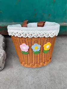 Woven bicycle basket with cute crochet flowers, lace trim fabric liner and storage bag.