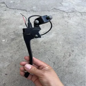 Detail view of the electric scooter brake lever assembly with aluminum alloy and wire connection.