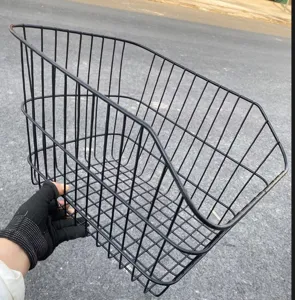 Black wire bicycle rear basket, durable metal mesh design for mountain and electric bikes.