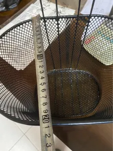 Black metal wire bicycle basket front hanging mesh basket for cycling storage and commuting.