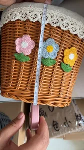 Front woven bicycle basket with floral crochet details, showing detailed height measurement size.