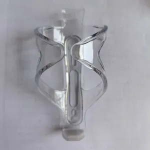 Clear plastic bicycle water bottle cage, lightweight mountain bike cup holder cycling accessory.