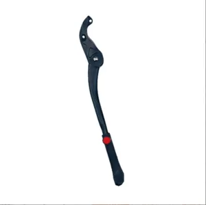 Detailed closeup view of black mountain bike adjustable kickstand with red release button