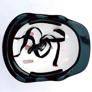 Kids sports helmet inner structure detail, showing foam padding and adjustable black straps.