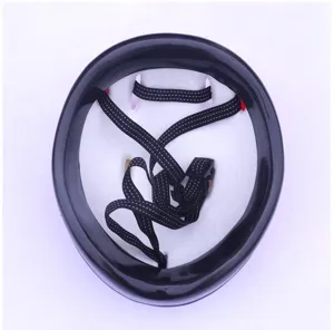 Inner detail view of children sports helmet, showing thick foam lining and adjustable black straps.