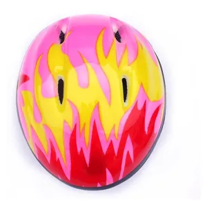 Children safety helmet detail view, pink and yellow flame design with ventilation holes.
