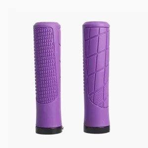 Purple bicycle handlebar grips with locking rings and anti-slip texture for mountain bikes.