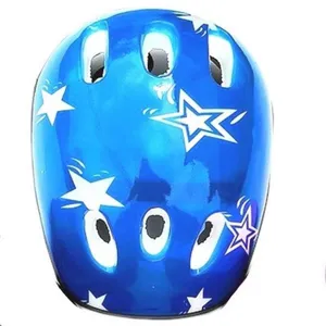 Close-up detail of blue kids sports helmet with star patterns and eye vents for safety.
