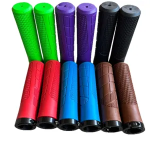 Mountain bike handlebar grips with single lock-on ring, anti-slip rubber grips for cycling.