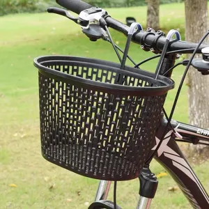 Black plastic woven bicycle front basket mesh design outdoor bike storage basket detail view.