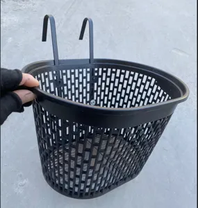 Black plastic bicycle front basket with metal hooks, mesh design for mountain bikes.