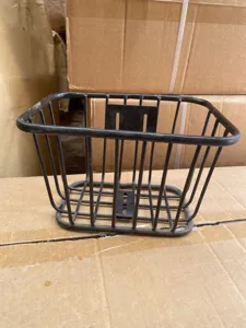 Front metal bicycle basket for kids, durable black wire design for convenient daily storage.