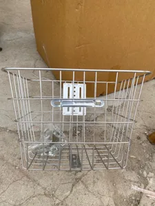 Durable metal front bike basket for electric bicycles with mounting hardware included.