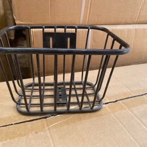 Durable front metal bicycle basket for kids, black wire bike storage basket accessory.