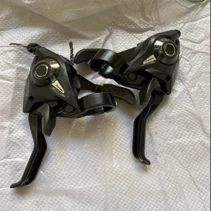 Aluminum alloy 21 24 speed integrated bicycle shifter and brake lever set with shift cables.