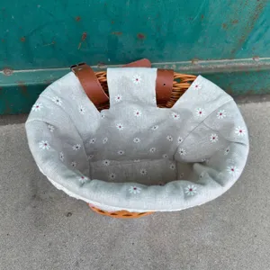 Wicker bicycle basket with cute daisy fabric liner, front storage basket for bike and e-bike.