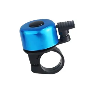 Detail view of a bright blue bicycle bell with a black plastic mount and sturdy clip.
