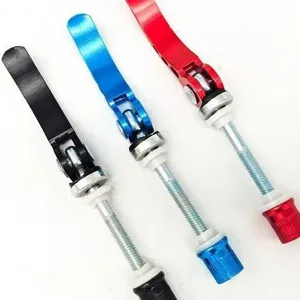 Detailed view of bicycle seatpost quick release skewer in multiple colors for bike.