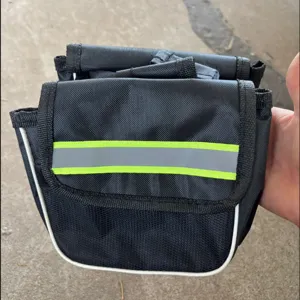 Black bicycle front bag with reflective strips for mountain bikes and riding accessories.