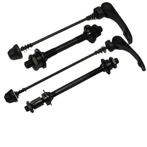 Detailed view of black bicycle quick release skewers and hollow axles for mountain and road bikes.