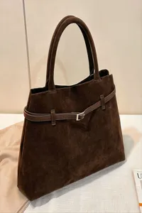 Brown suede tote bag detail, retro style, large capacity, elegant shoulder handbag for women.