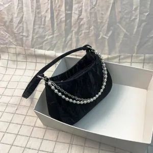 Korean style black underarm shoulder bag for women with pearl and metal double chain.