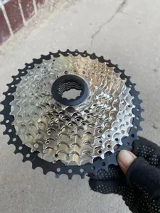 Detail view of the mountain bike cassette sprockets, showing precision steel gears and lockring.