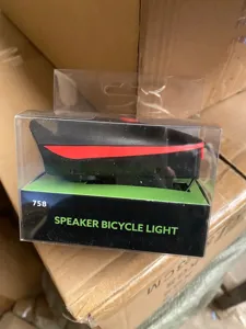 Rechargeable bicycle light with speaker, bright front bike lamp for safe night riding.