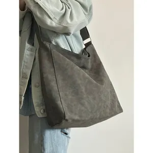 Casual large capacity slouchy shoulder tote bag detail shot for daily commute and students.
