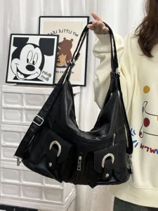 Black multi-pocket hobo shoulder bag, casual PU leather commuting travel crossbody backpack.