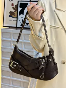 Trendy retro brown motorcycle shoulder bag for women, chic buckle design and punk style underarm bag.