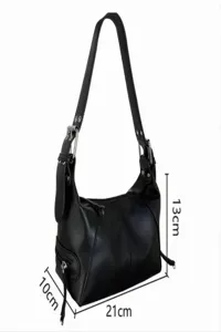Close-up detail of the black leather retro underarm shoulder bag showing size measurements.