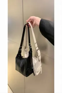 Retro chic PU leather shoulder bag for women, trendy minimalist underarm hobo handbag.