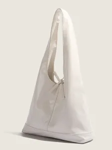 Elegant white soft leather shoulder bag for women, chic bow tote hobo bag for daily commute.
