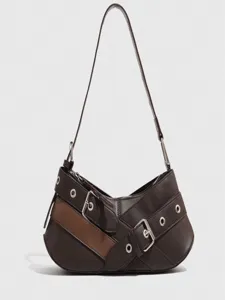 Retro brown underarm motorcycle shoulder bag for women, trendy baguette handbag with metal buckle.