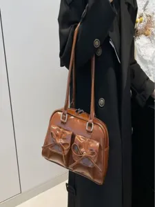 Brown patent leather shoulder bag with cute bows, elegant ballet style fashion women handbag.