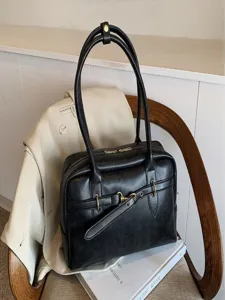 Retro large capacity black shoulder bag, elegant faux leather women handbag for daily commute.
