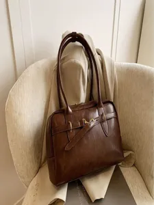 Vintage large capacity brown leather shoulder bag, chic underarm Boston handbag for women.
