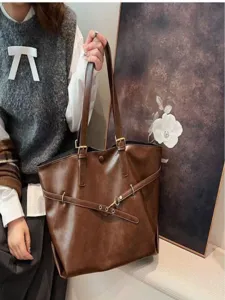 Fashionable brown tote bag for women, large capacity PU leather shoulder bag for daily commuting.