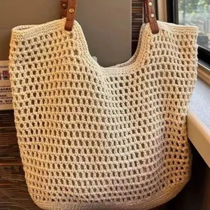 Chic crochet hollow out woven tote bag for women, summer beach casual beige mesh handbag.