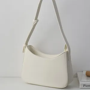 Minimalist white shoulder bag, elegant underarm hobo purse for daily commuting and fashion style.