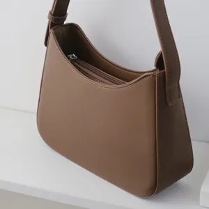 Stylish brown hobo shoulder bag for women, minimalist PU leather daily commute underarm purse.