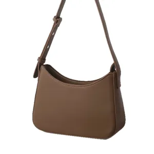 Stylish brown shoulder bag for women, elegant PU leather underarm bag for daily wear and work.